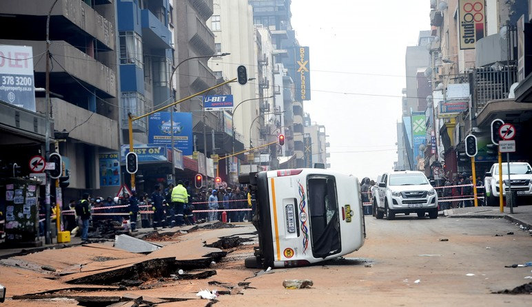 Emergency personnel and members of the law enforcement attend to damages caused by the gas explosion that took place along Bree street in the Johannesburg CBD. Picture: Itumeleng English/African News Agency (ANA)