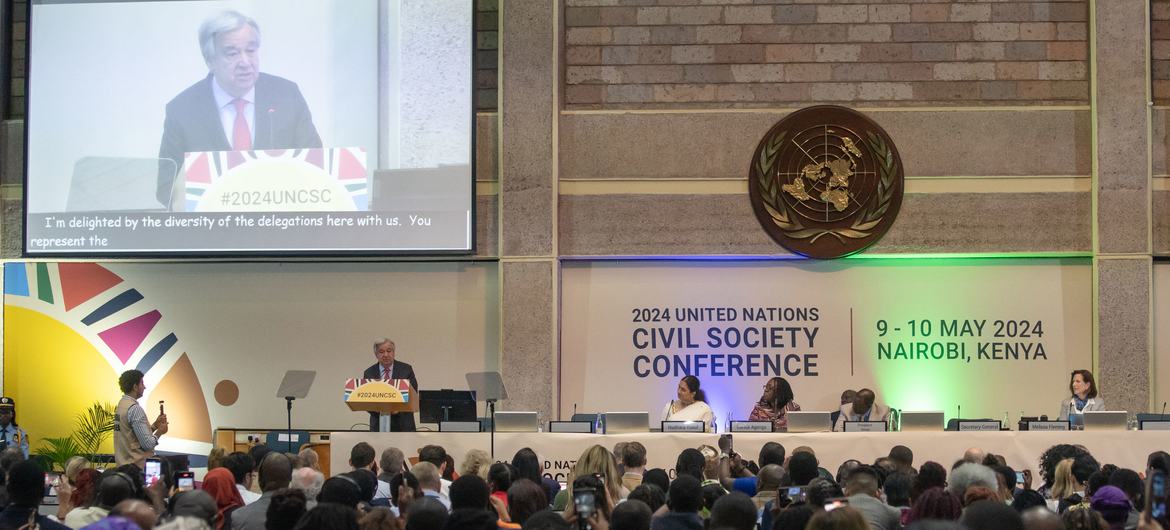 UN Photo/Duncan Moore Secretary-General António Guterres (at podium) addresses the closing of the UN Civil Society Conference in Nairobi, Kenya.
